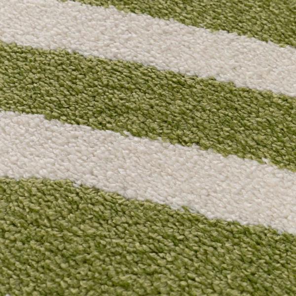 Close-up of green and white striped fabric texture