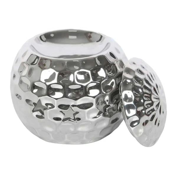 Silver oil burner with open side lid showing inner bowl, disco ball texture