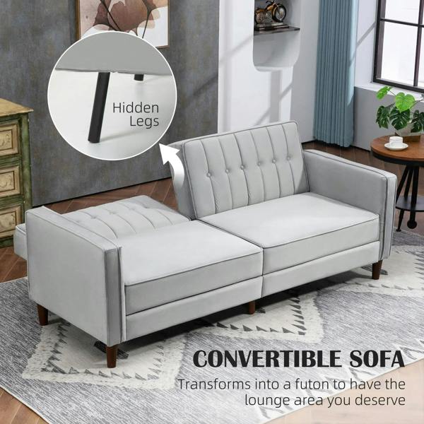 Light grey convertible sofa with tufted split back and smooth armrests