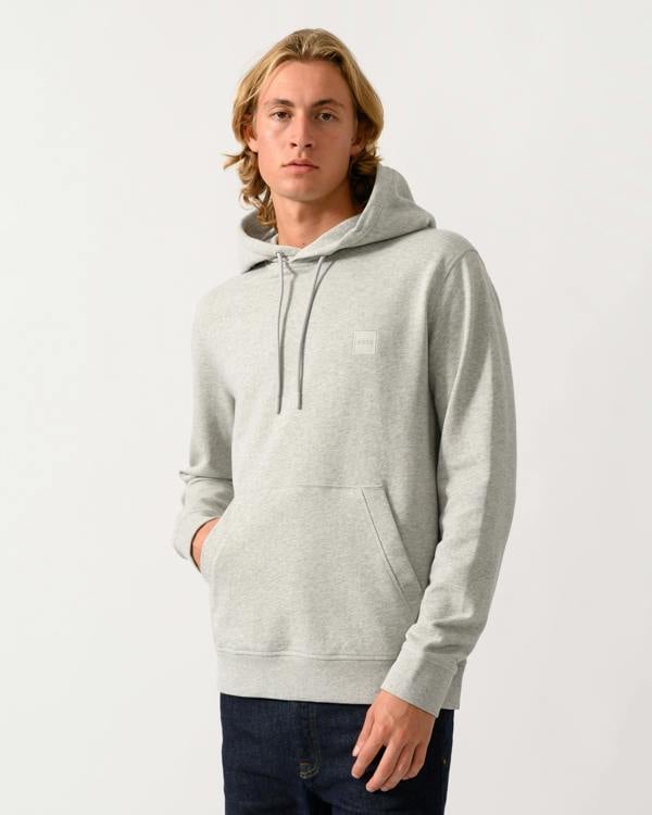 model wearing a BOSS Orange Wetalk Mens Pullover Hoodie With Logo Patch in Open Grey 086