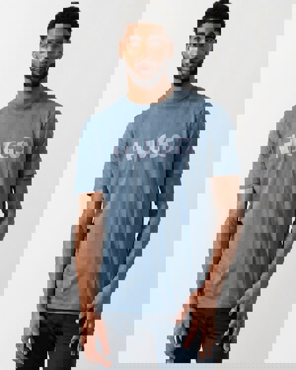 Model wearing a HUGO Dulivio Mens T-Shirt in Open Blue