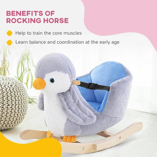 Plush penguin rocking horse with padded backrest, black handle strap, and wooden rockers
