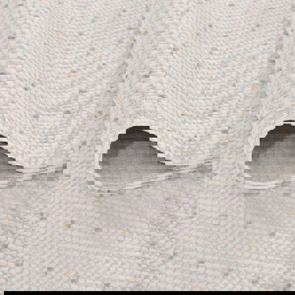 Living Room rug, beige-cream colours, dots, practicality in mind, the rug is anti-allergic.