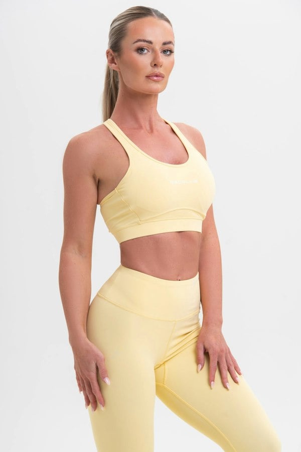 Discipline Womens Yellow Leggings front view.