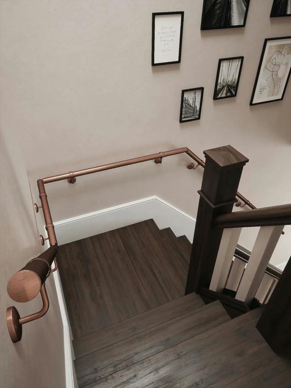 downward view Sambourne Antique Copper Quarter Landing Handrail