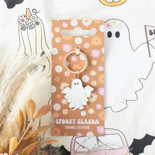Enamel ghost keyring on retail card with floral pattern backing