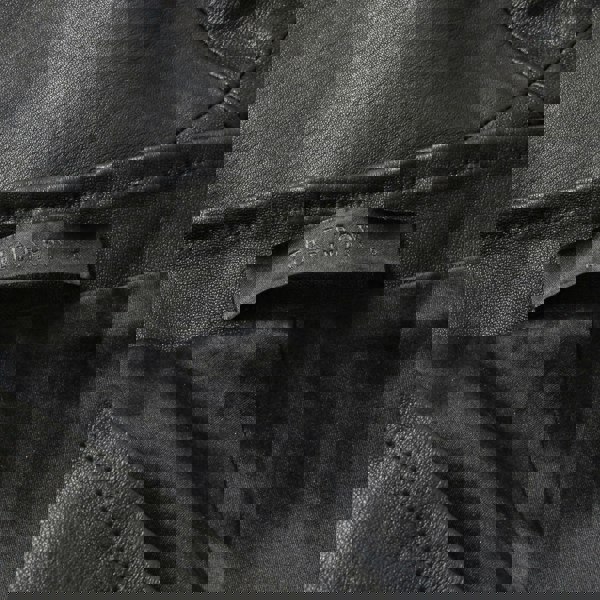 The Row slim-fitting leather trousers in a minimalist silhouette