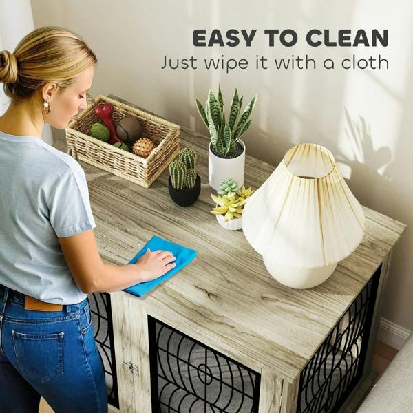 Grey dog crate furniture table with black wire doors and washable-looking top surface