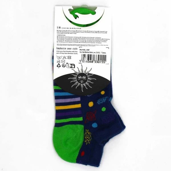 Low bamboo socks on tag: dark navy with green foot, rainbow stripes and chakra patterns