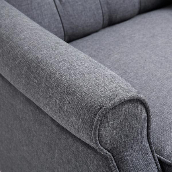 Light gray upholstered recliner armrest with curved padded edge