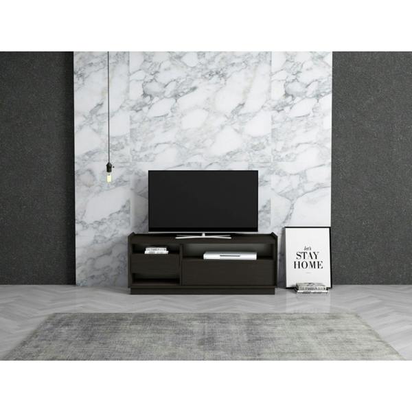 TV cabinet in a modernly decorated living room. It shows the 3 shelfs in use and a TV on top.