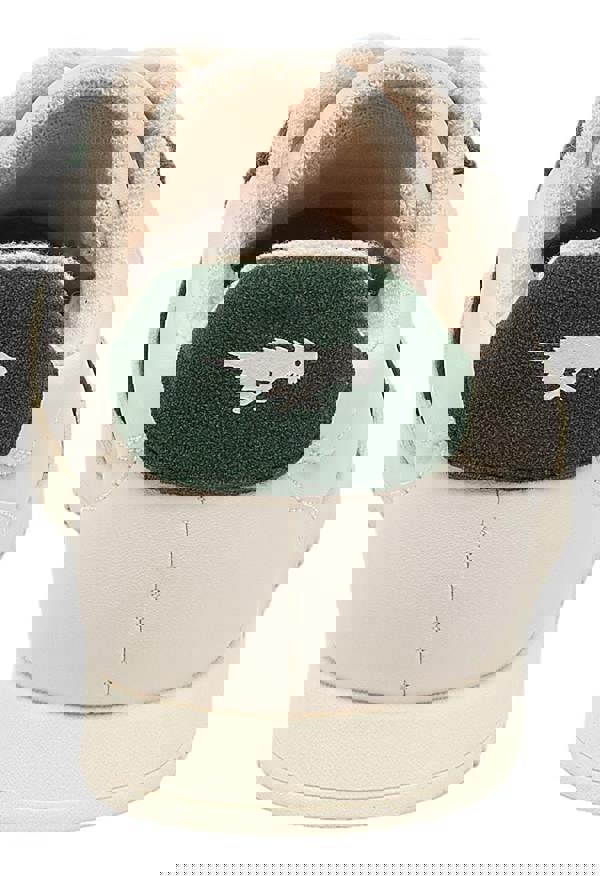 Rocket Dog Bolt Womens Casual Smart Lace Up Shoes Trainers, close-up view of the back of the shoe showcasing green suede heel with a white animal graphic logo and beige cushioned collar.