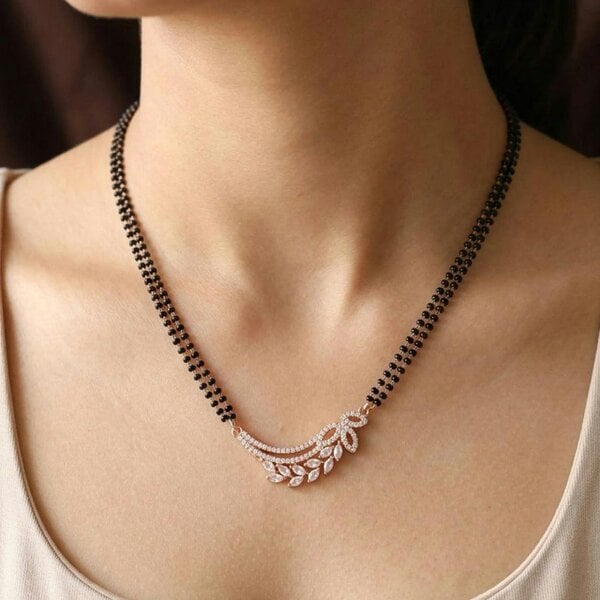 The Colourful Aura Rose Gold CZ Crystal Wing Leaf Mangalsutra Black Bead Necklace