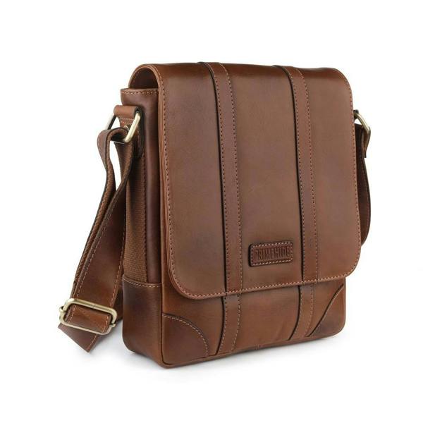 Side profile of Brown leather messenger bag showing 7cm depth and compact design