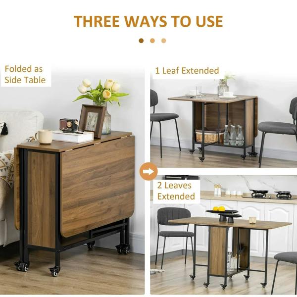 Brown drop-leaf dining table with extended leaves and black base on caster wheels