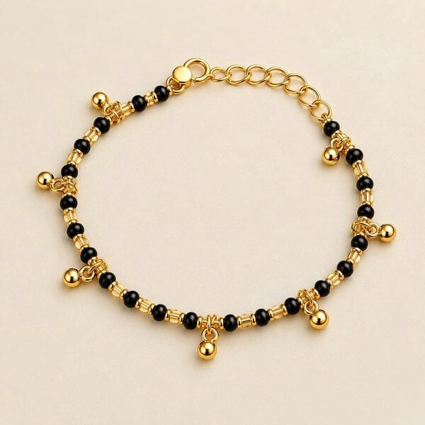 The Colourful Aura Gold Plated Black Bead Dangling Gold Ball Charm Kids Nazaria Bracelet