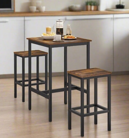 Rustic brown industrial dining table with two chairs and footrests, ideal for small spaces

