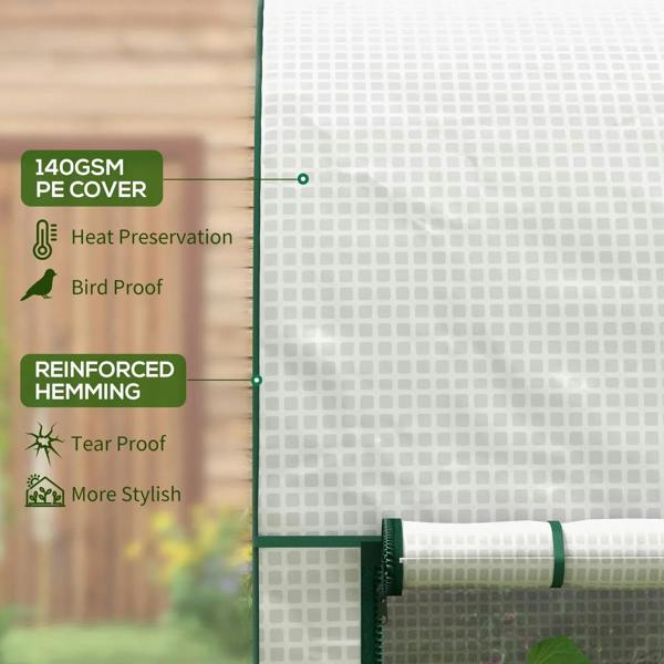 White greenhouse cover panel with green grommets and reinforced edge near a corner