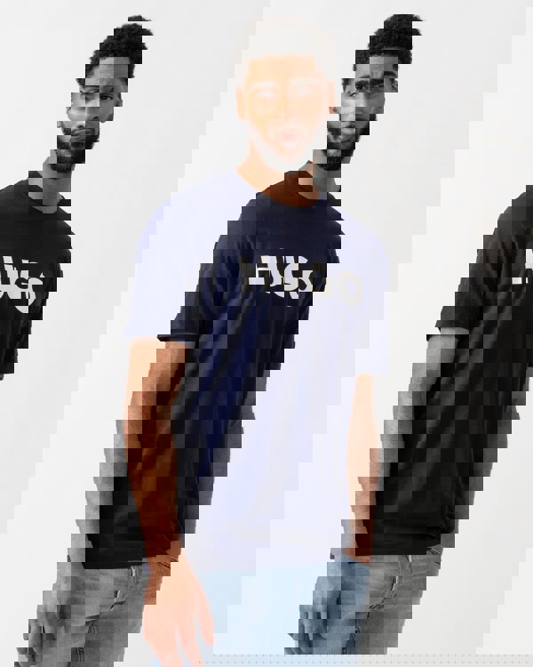 Model wearing a HUGO Dulivio Mens T-Shirt in Navy