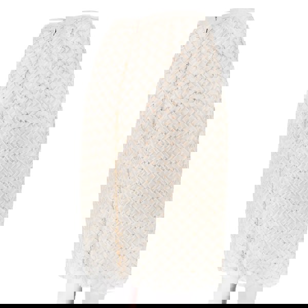 A Christopher Kane pencil skirt which is intricately shaped to appear woven
