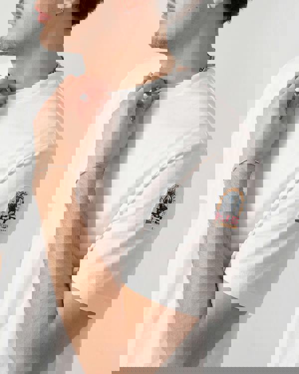 side shot of a model wearing s Parajumpers Shispare Mens T-Shirt in White 501