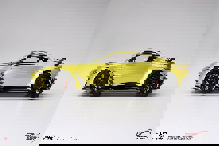 TSM Aston Martin V12 Vantage Cosmopolitian Yellow 1:18 Scale TSM TS0453