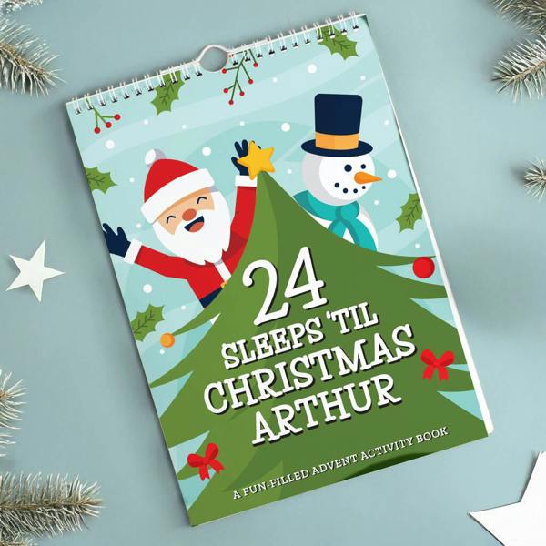 A personalised 24 Sleeps Activity Advent Calendar with the name Arthur displayed on a soft blue background with frosted pine needles.
