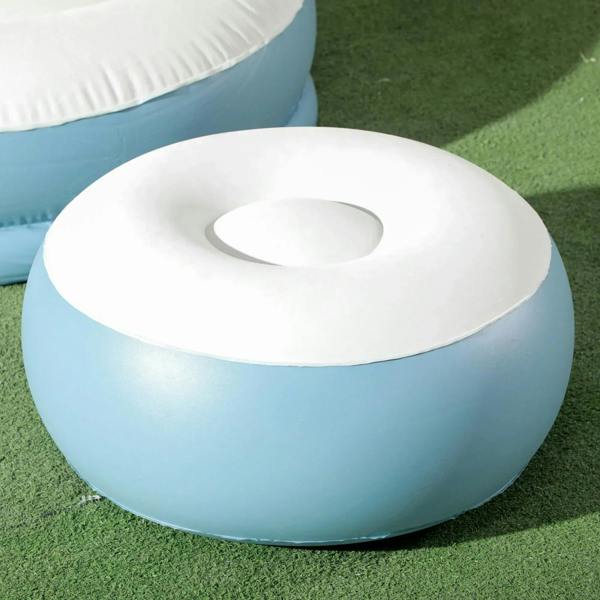 Round inflatable footstool with cup holder opening, white top and light-blue sides