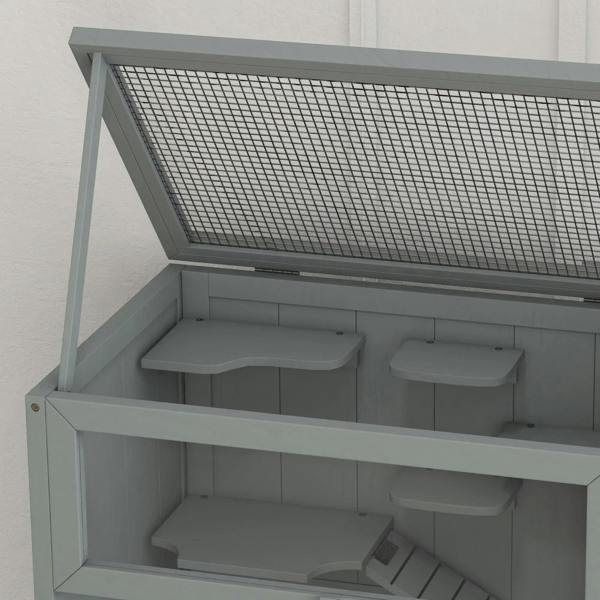 Grey open-top cage showing internal platforms, side walls, and small access ramp