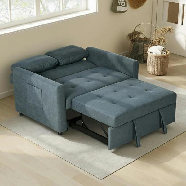 Charcoal grey loveseat sofa bed fully unfolded into a flat, tufted sleep surface