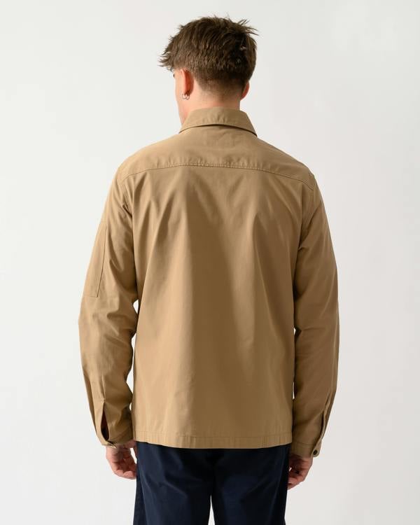 back shot of a model wearing a HUGO Emmond Mens Zip Overshirt in Beige Overflow 928