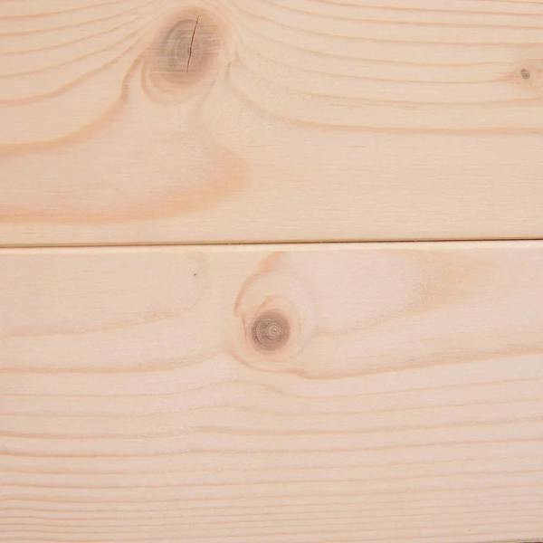 Close-up of light natural wood boards with visible grain and knots