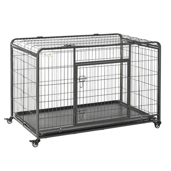 Dark grey metal dog kennel with front door and wheeled base, removable tray inside