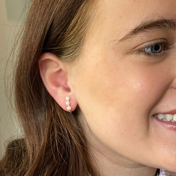 Small pearl clip-on earrings, triple pearl drop design, graduated pearls, gold-tone setting, elegant vintage-inspired jewellery, timeless accessory
