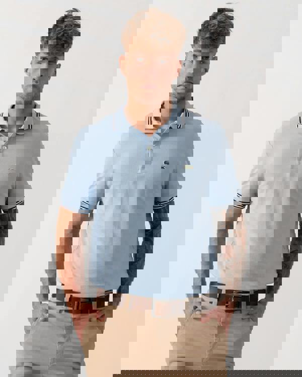 Model wearing Lacoste Contrast Collar Pique Mens Regular Fit Polo Shirt in Chambray - Main