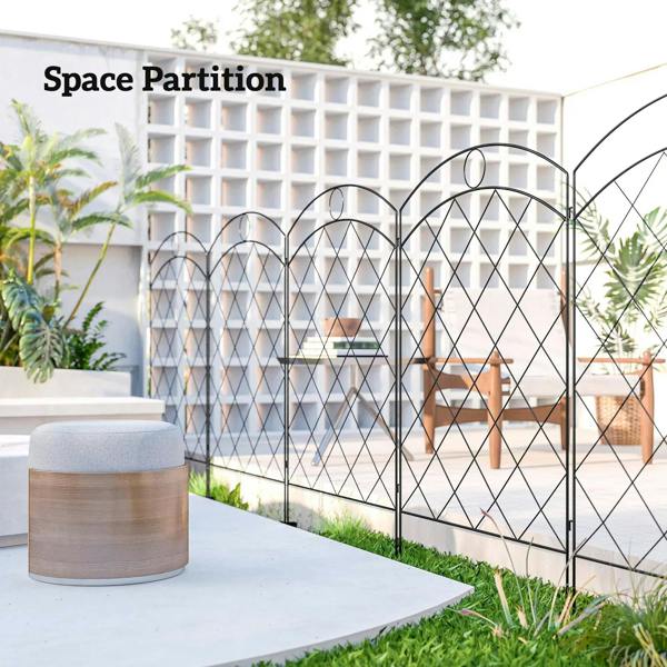 Black steel decorative outdoor picket fence panels forming a curved partition with diamond grid.