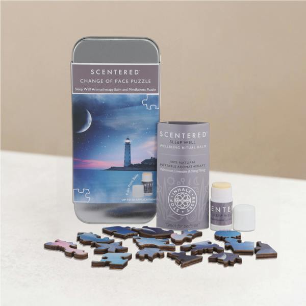 Scentered Change of Pace Puzzle and packaging on a warming background