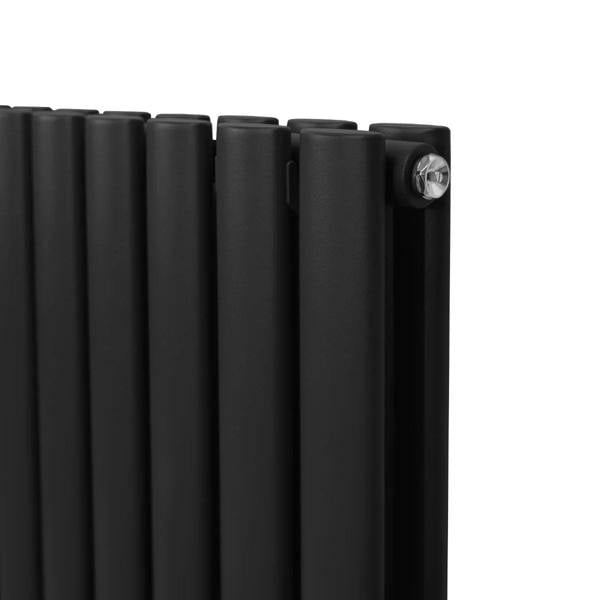 Sleek black oval column radiator with smooth matte finish and modern design, featuring multiple vertical panels for efficient heating