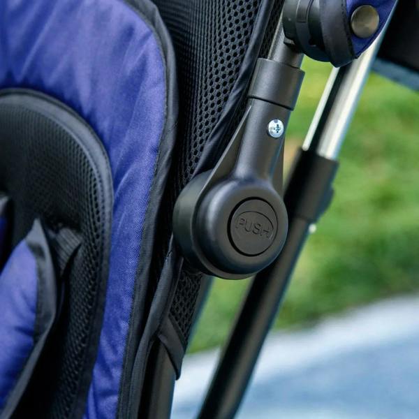 Kids trike push bike close-up of handle mechanism and seat frame joint