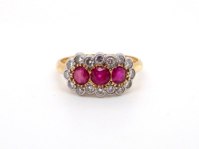 Vintage Tom An 18 carat gold triple cluster ruby and diamond ring