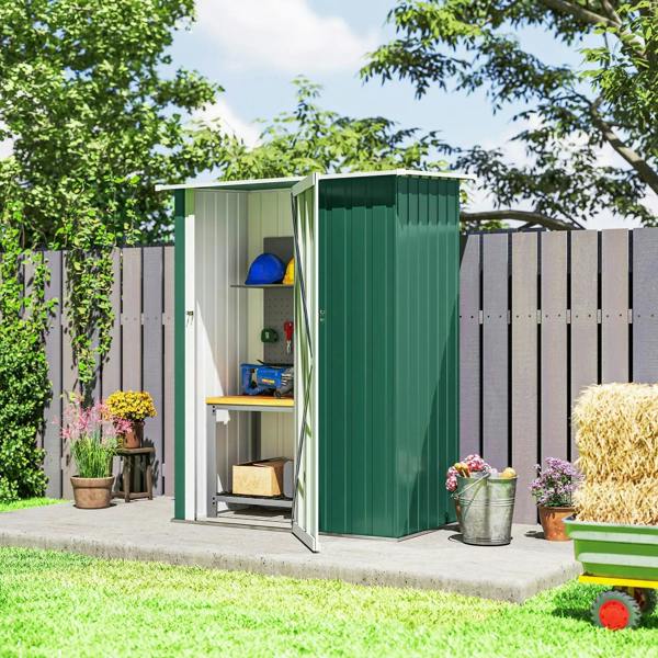 Green metal storage shed with open door and interior shelves for equipment