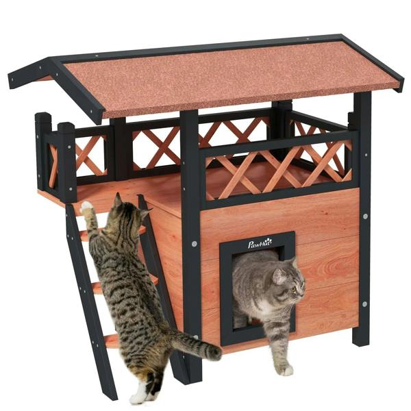Outdoor cat house with balcony, roof, front door, and steps; dark frame and brown wood