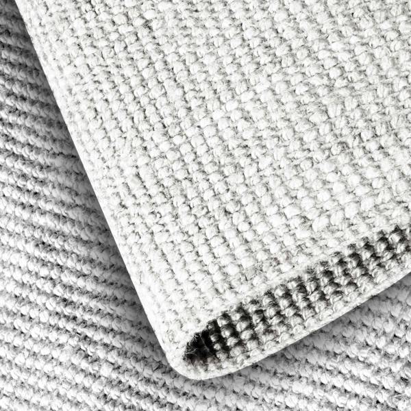 Close-up of textured fabric with a zipper