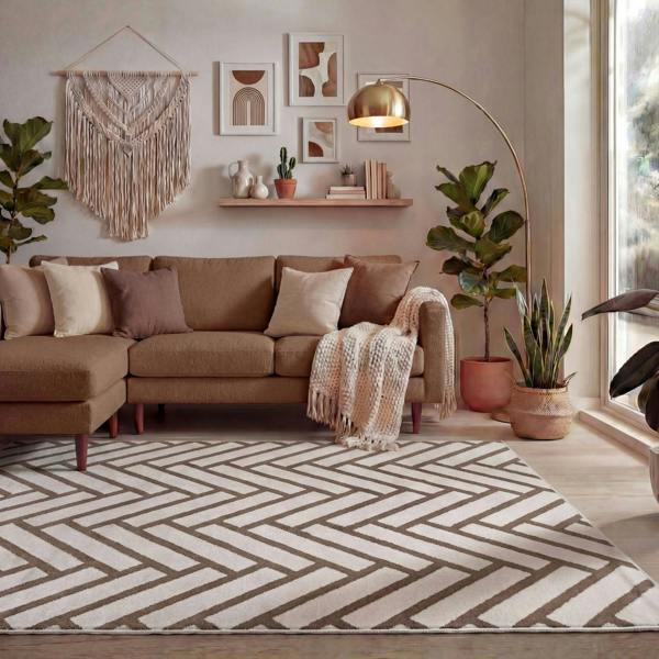 Cozy living room with a brown sectional sofa, patterned rug, and decorative elements.