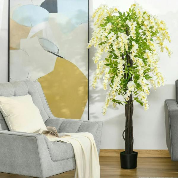 White faux wisteria tree with cascading blossoms, planted in a black pot