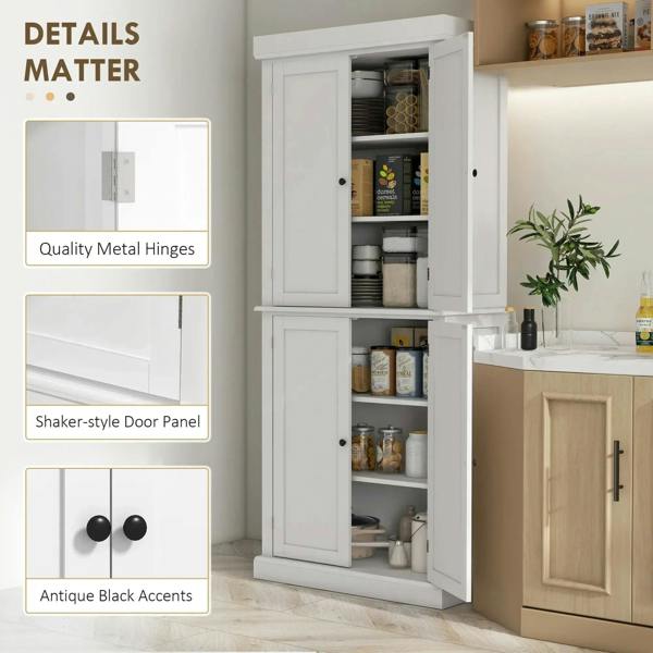 White cabinet with metal hinges and black knob accents on paneled doors