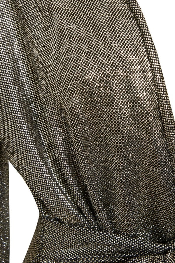 A close up of a Sarvin Sequin Wrap Dress.