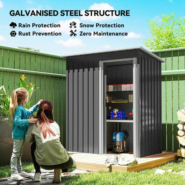 Black metal garden storage shed with open sliding door, ridged panels and sloped roof.