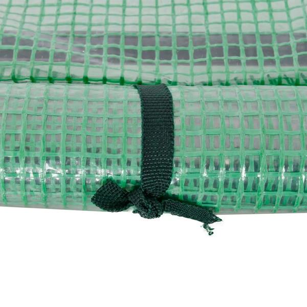 Green PE cover with black zipper and fastening tab for securing the greenhouse door