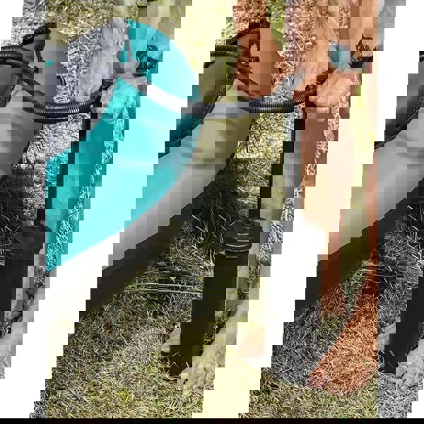 Black Bestway Air Hammer inflation pump with hose for teal kayak